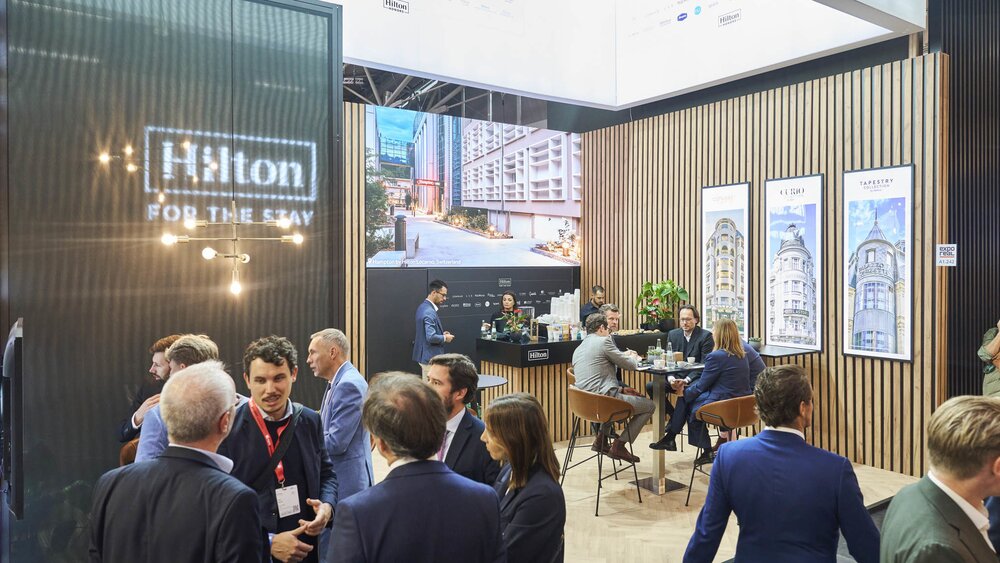Many people at the Hilton exhibition stand at EXPO REAL.
