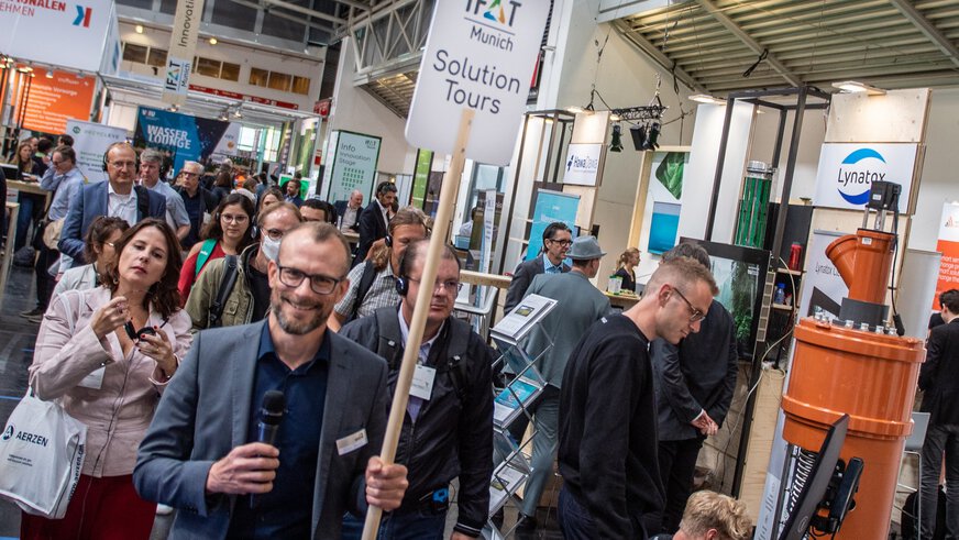 Visitors on the Solution Tour “Technology development in drinking water analysis” at the IFAT Munich exhibition grounds