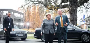 HPI Director Professor Christoph Meinel in conversation with Federal Chancellor Angela Merkel