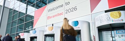 Entrance of Messe München with “Welcome to ceramitec 2026” signage and visitors entering.