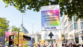 A street sign at a Pride parade reads in German: “We wish everyone a diverse CSD 2026.”