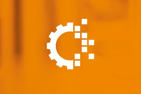 White cogwheel icon on orange background, dissolving into pixels to the right.