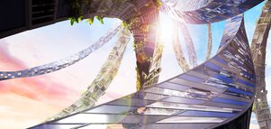 3D-Grafik mehrerer, teils begrünter Hochhäuser, die sich gebogen und verdreht in den strahlend blauen Himmel winden.